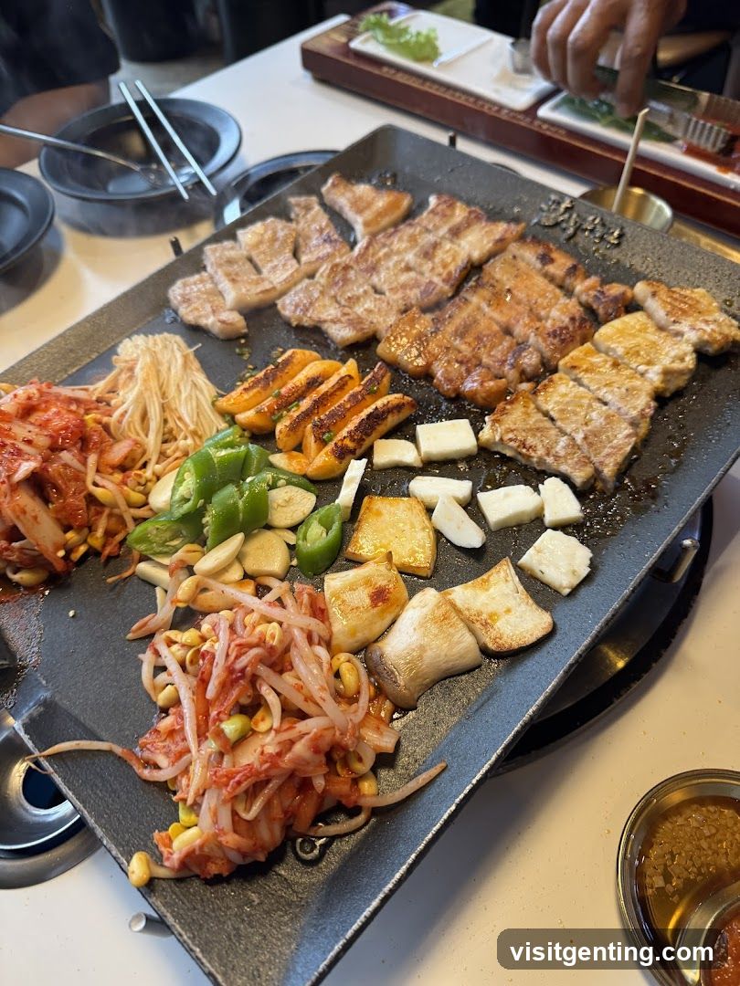 Grilled meat and vegetables on a hot plate
