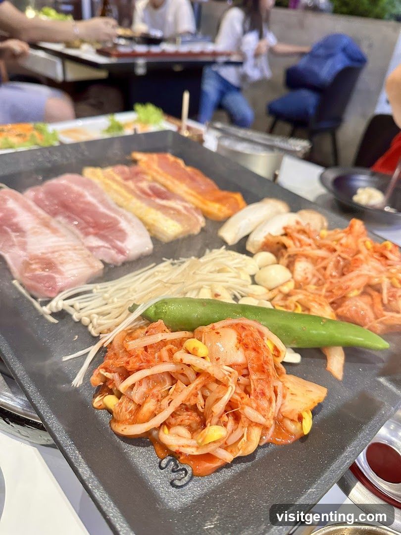 Grilled meat and vegetables on a hot plate
