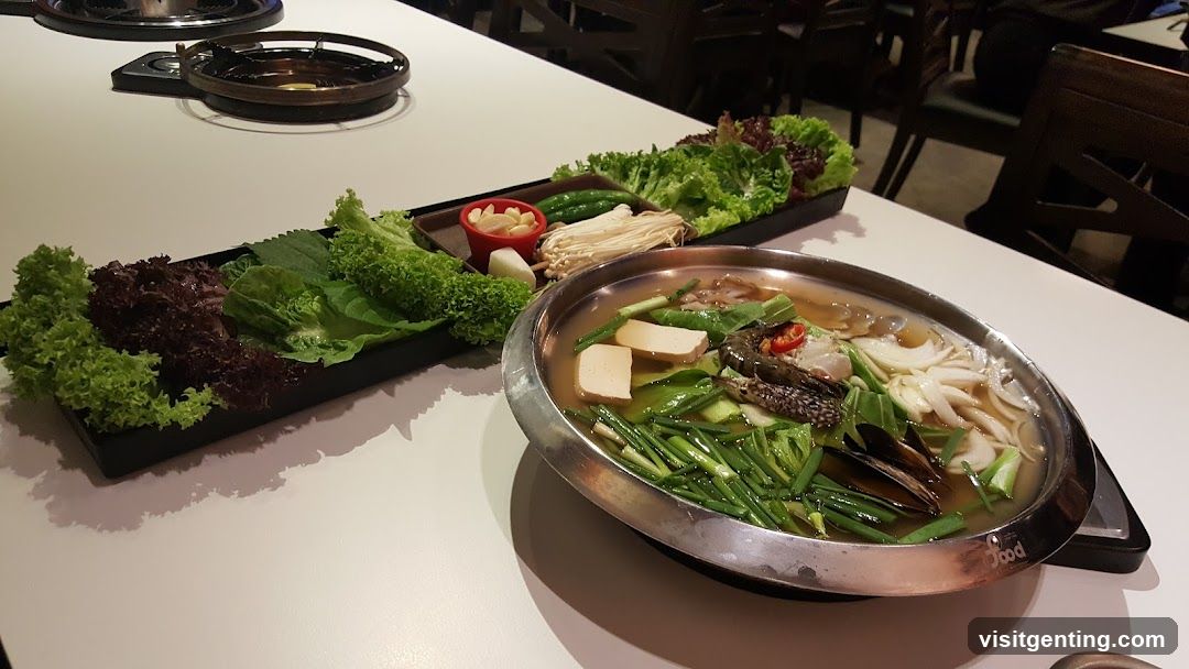 Restaurant Interior with Hot Pot and Vegetables