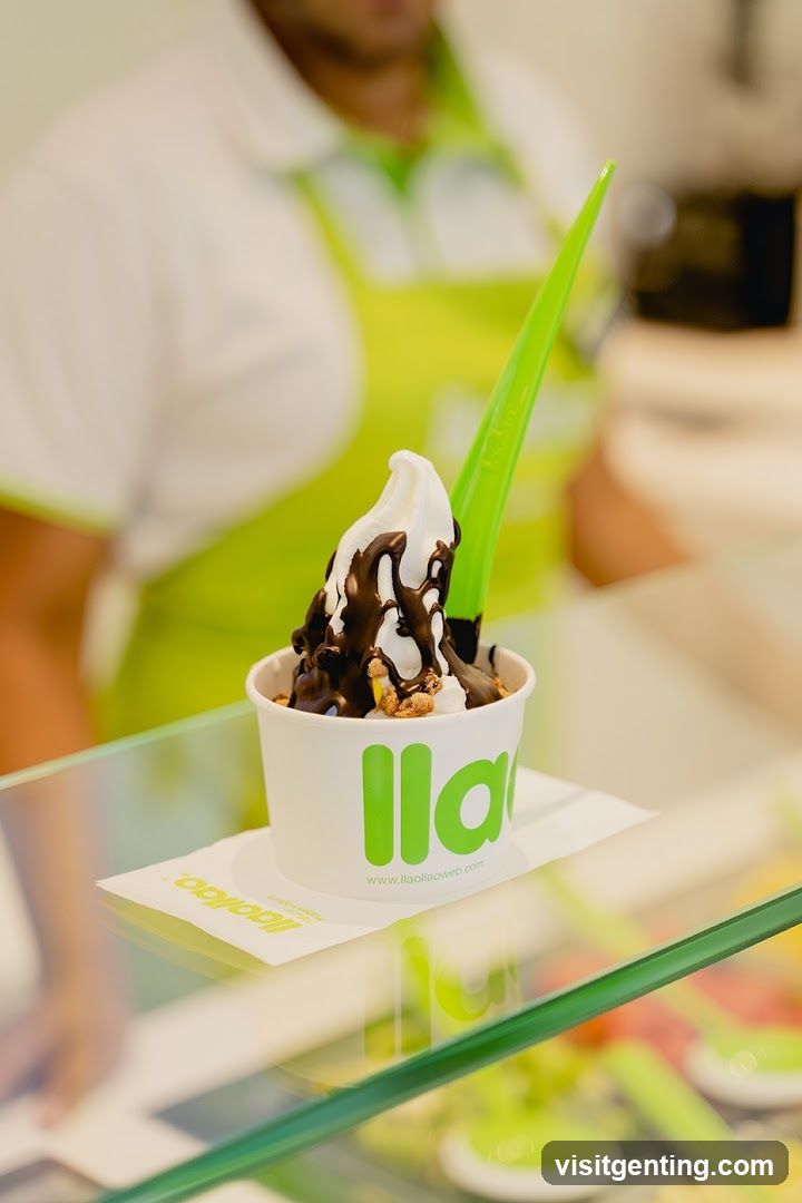 Soft serve dessert in cup with green spoon