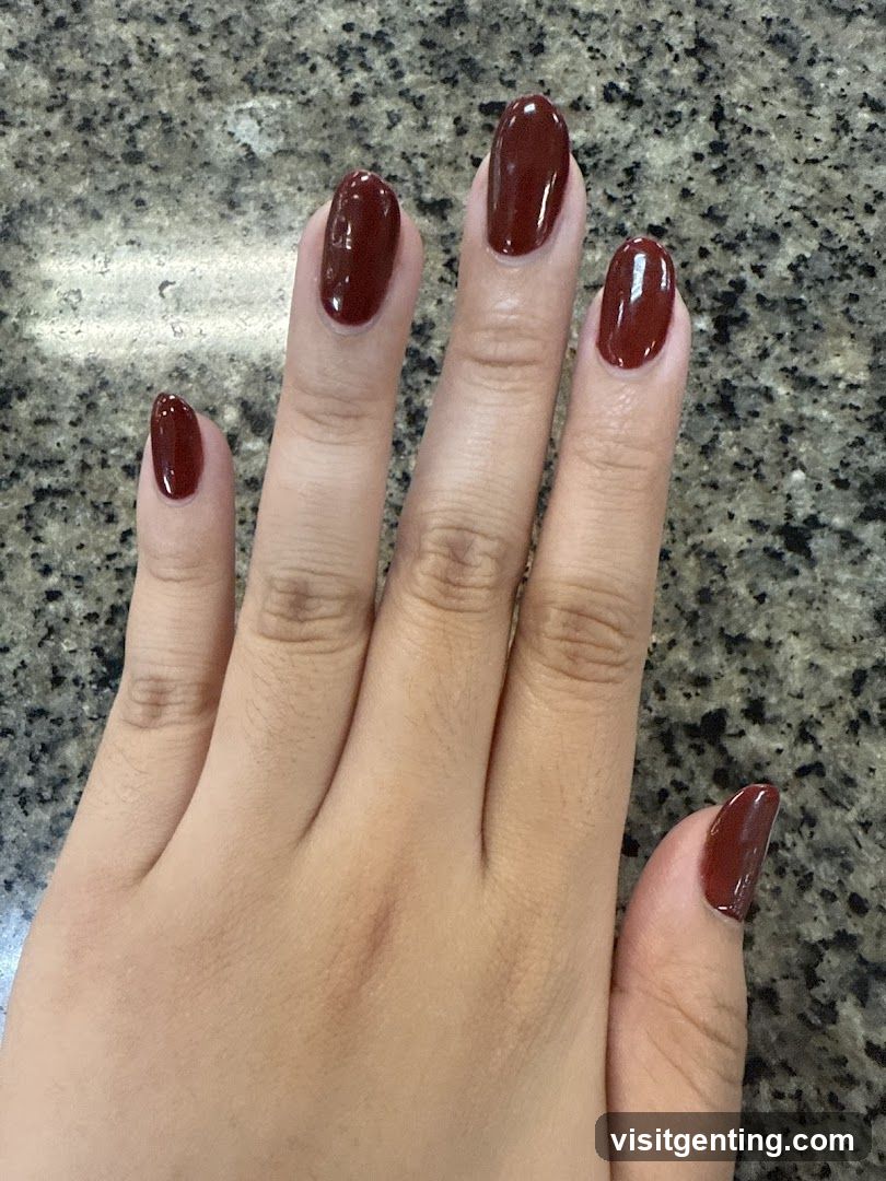 Hand with Red Nail Polish