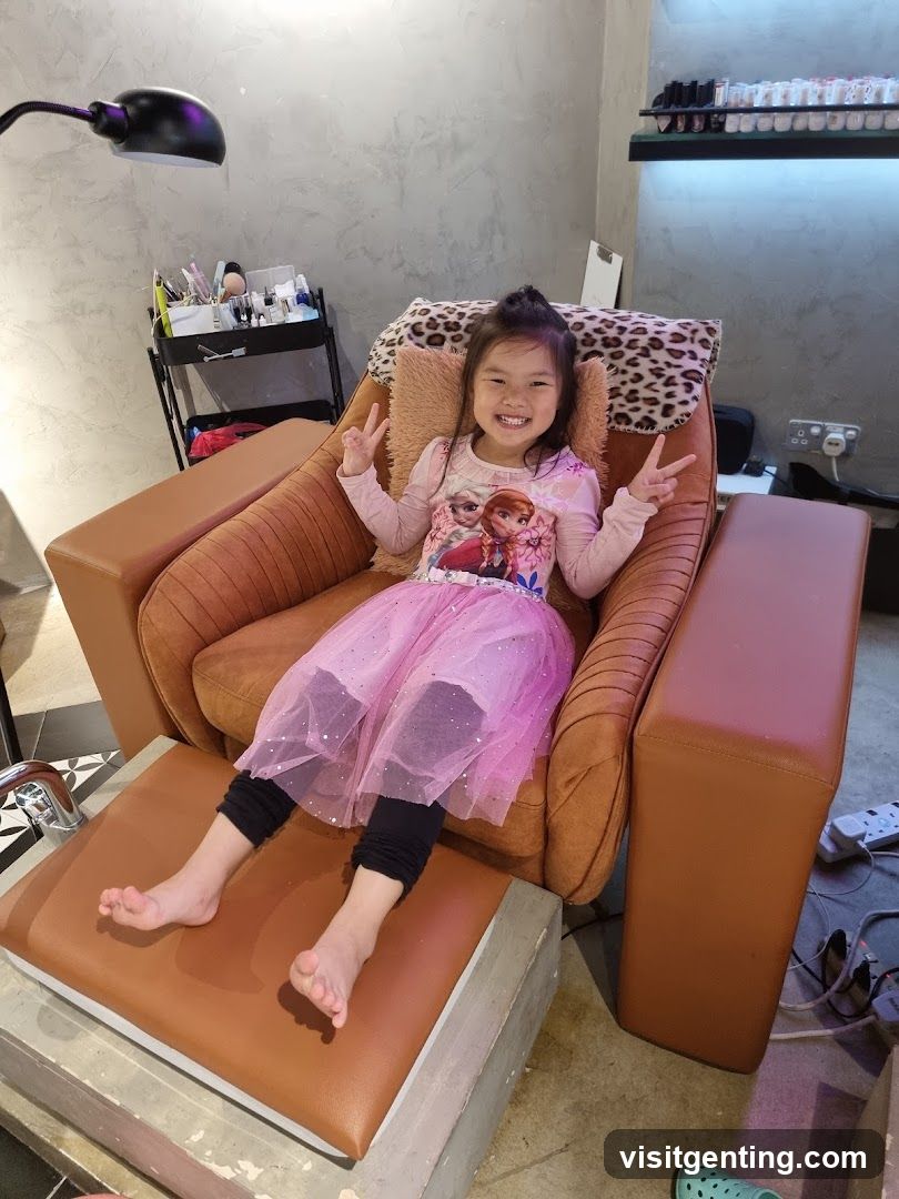 Child in nail salon chair
