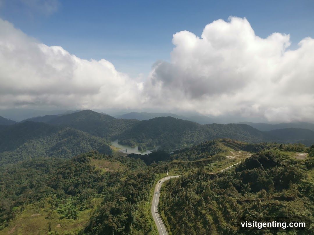 Mountainous Landscape with Road and Clouds