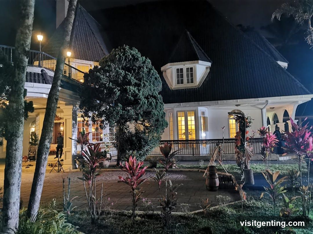 Nighttime exterior of a residential-style building
