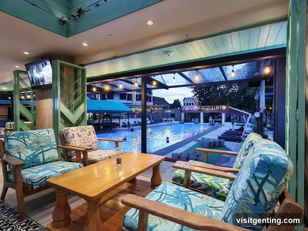 Indoor lounge area overlooking pool