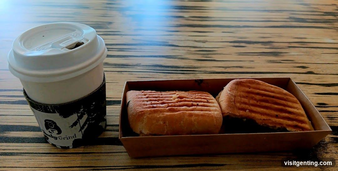 Coffee and Sandwiches on Wooden Table