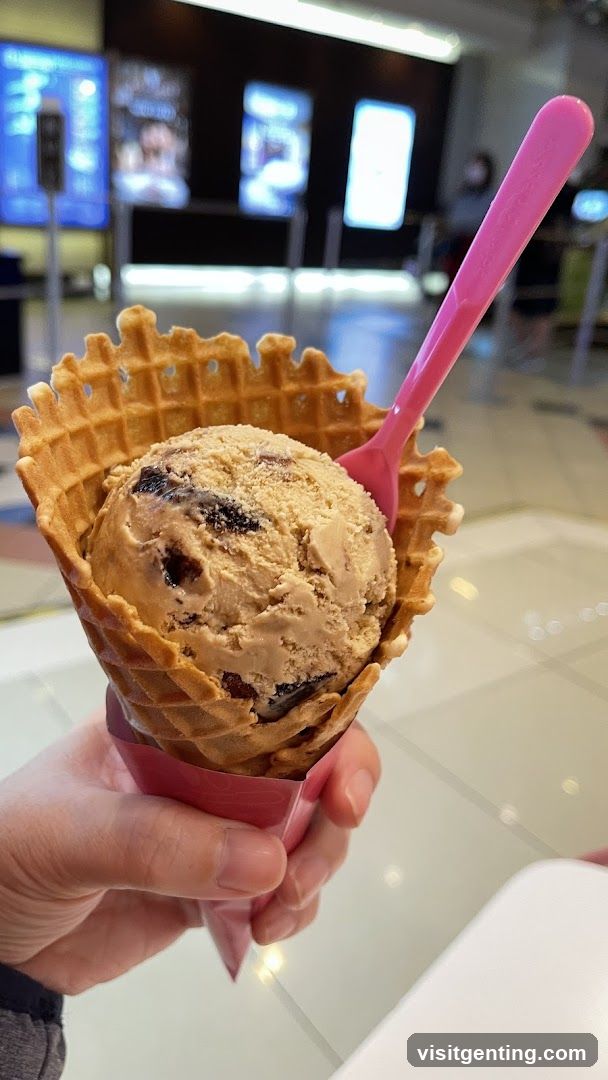 Ice Cream Cone Held in Hand