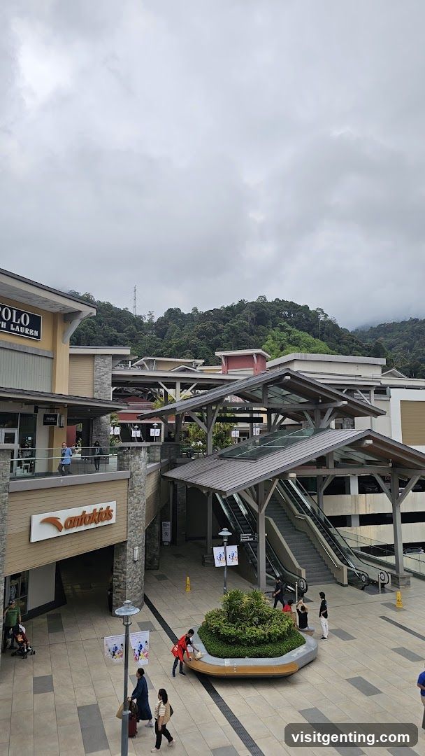 Shopping Mall Exterior with Escalators and Greenery