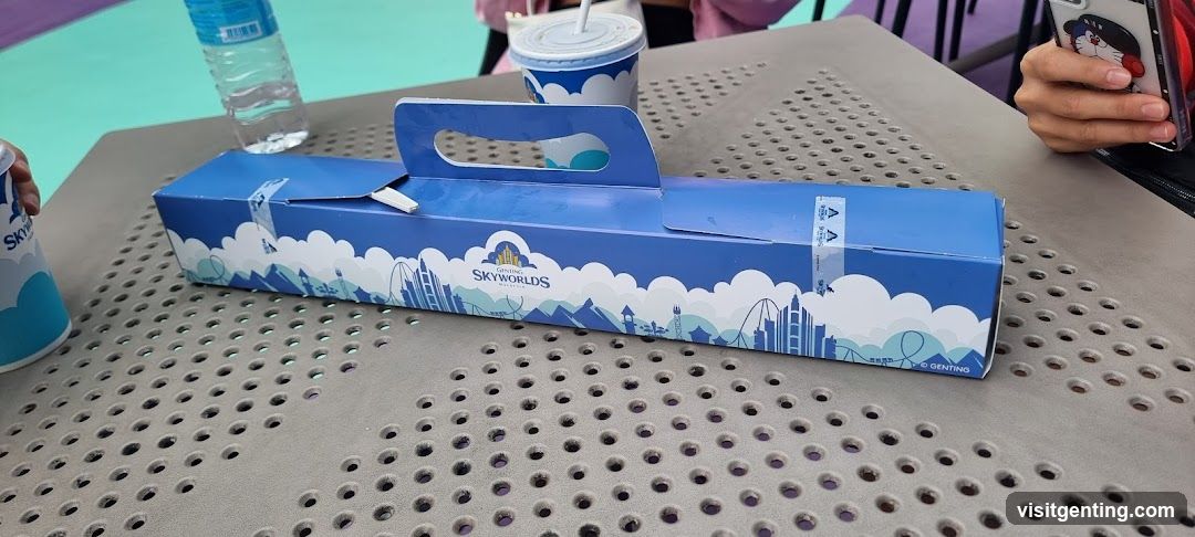 Skyworlds branded food box on table
