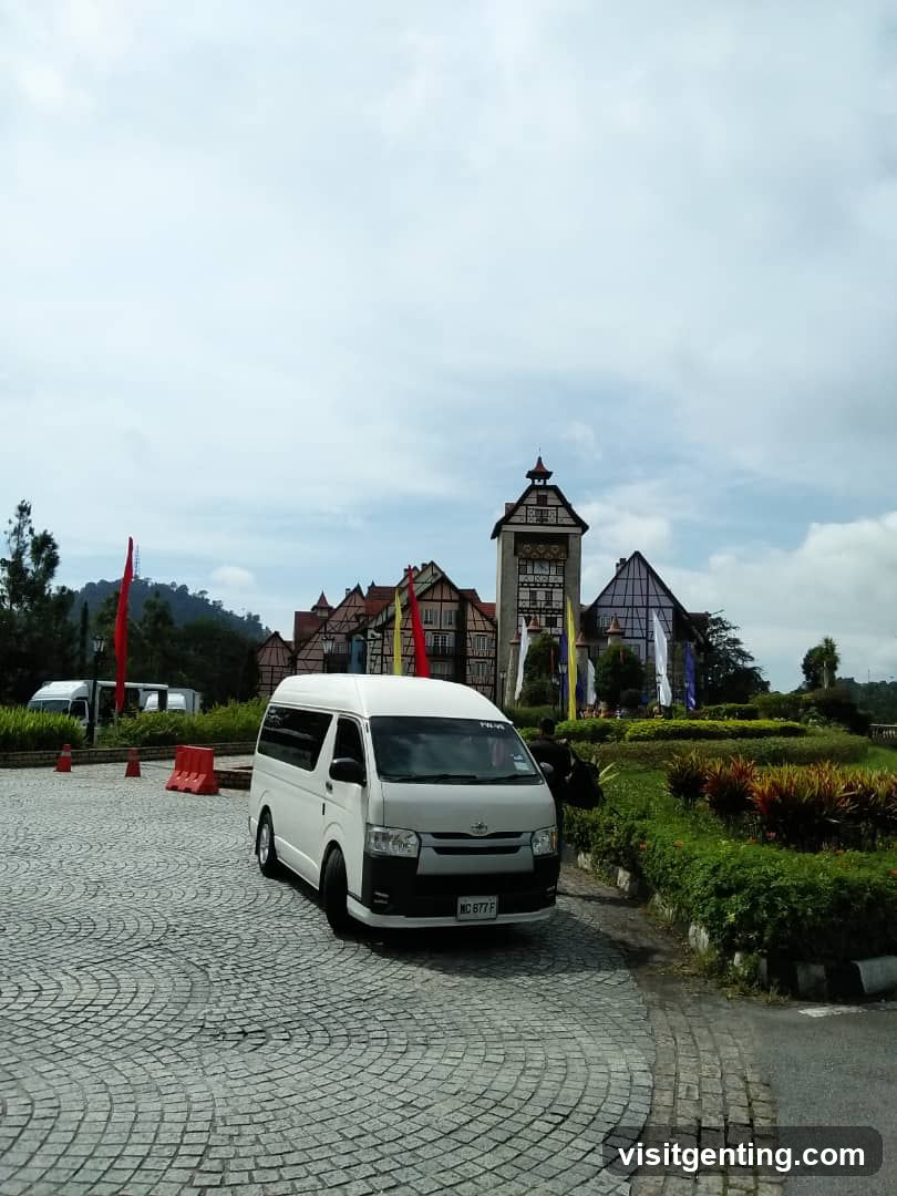 Van parked at European-style building entrance