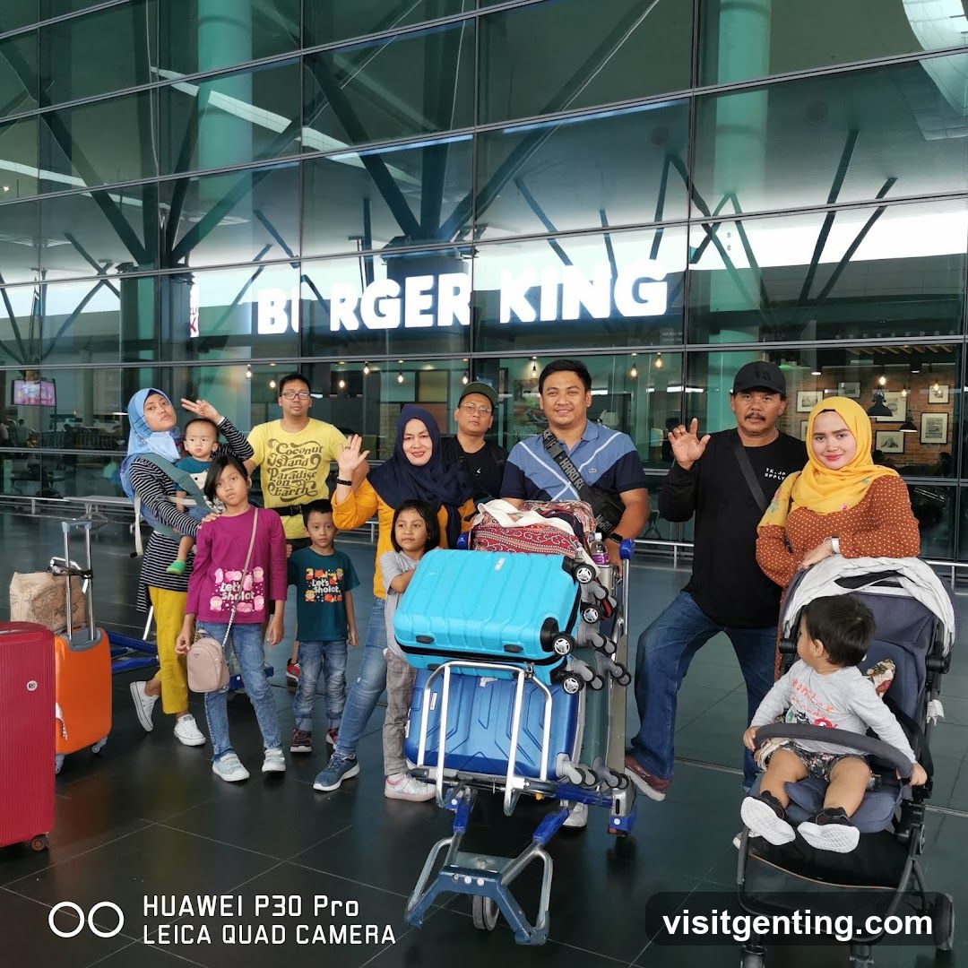 Group photo at airport terminal