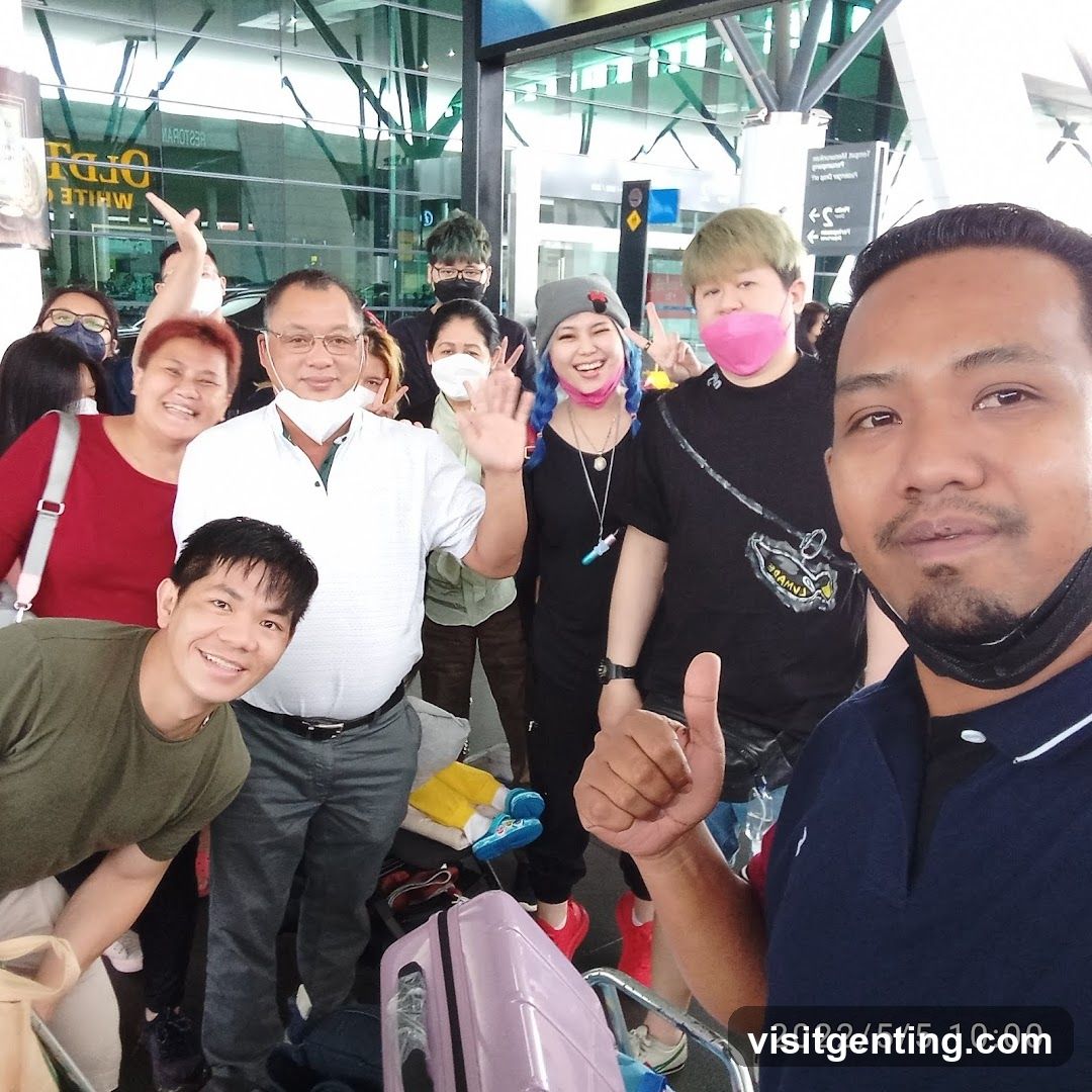 Group selfie at airport terminal