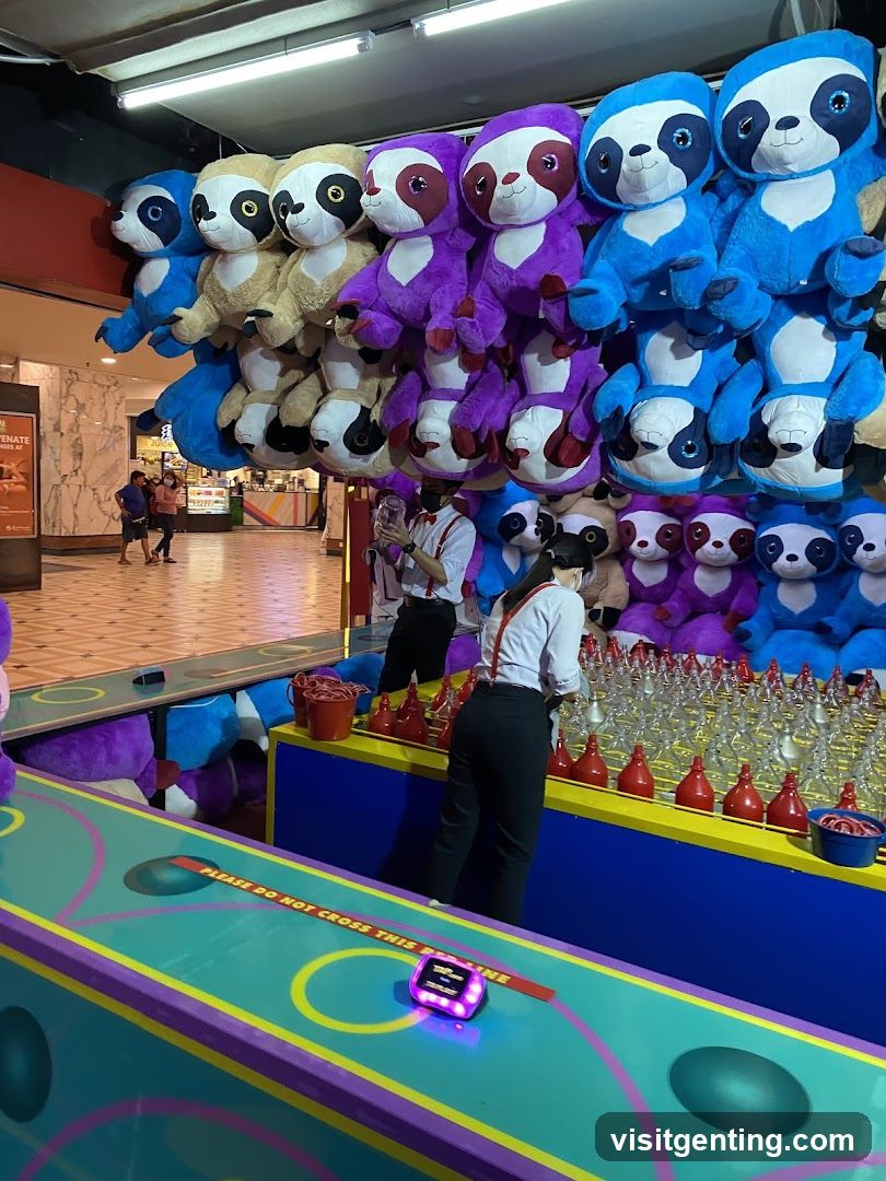 Arcade Game Booth with Sloth Plushies