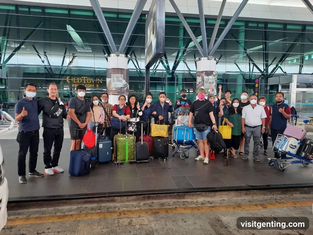 Group photo at airport terminal