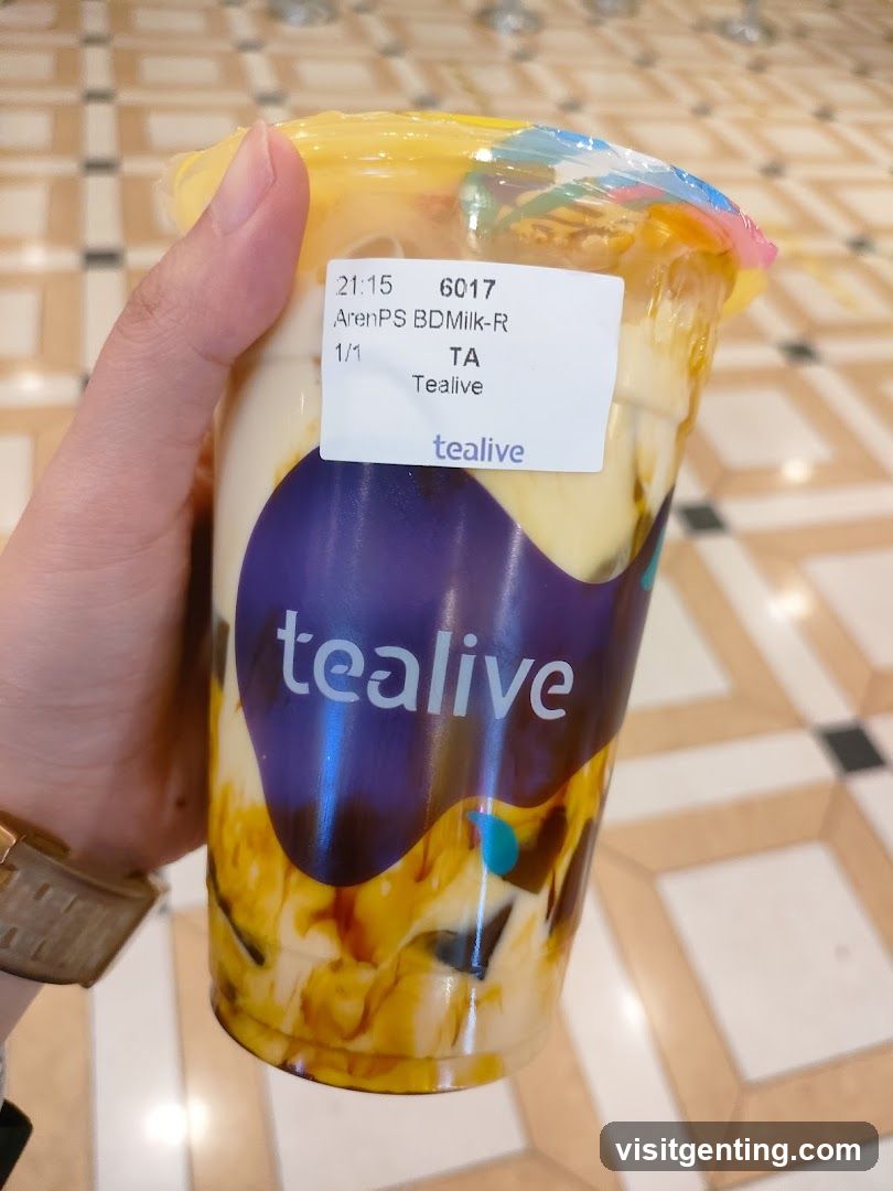 Tealive drink held in hand