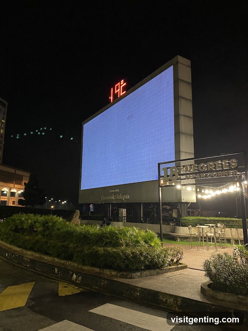Nighttime outdoor scene with large digital display