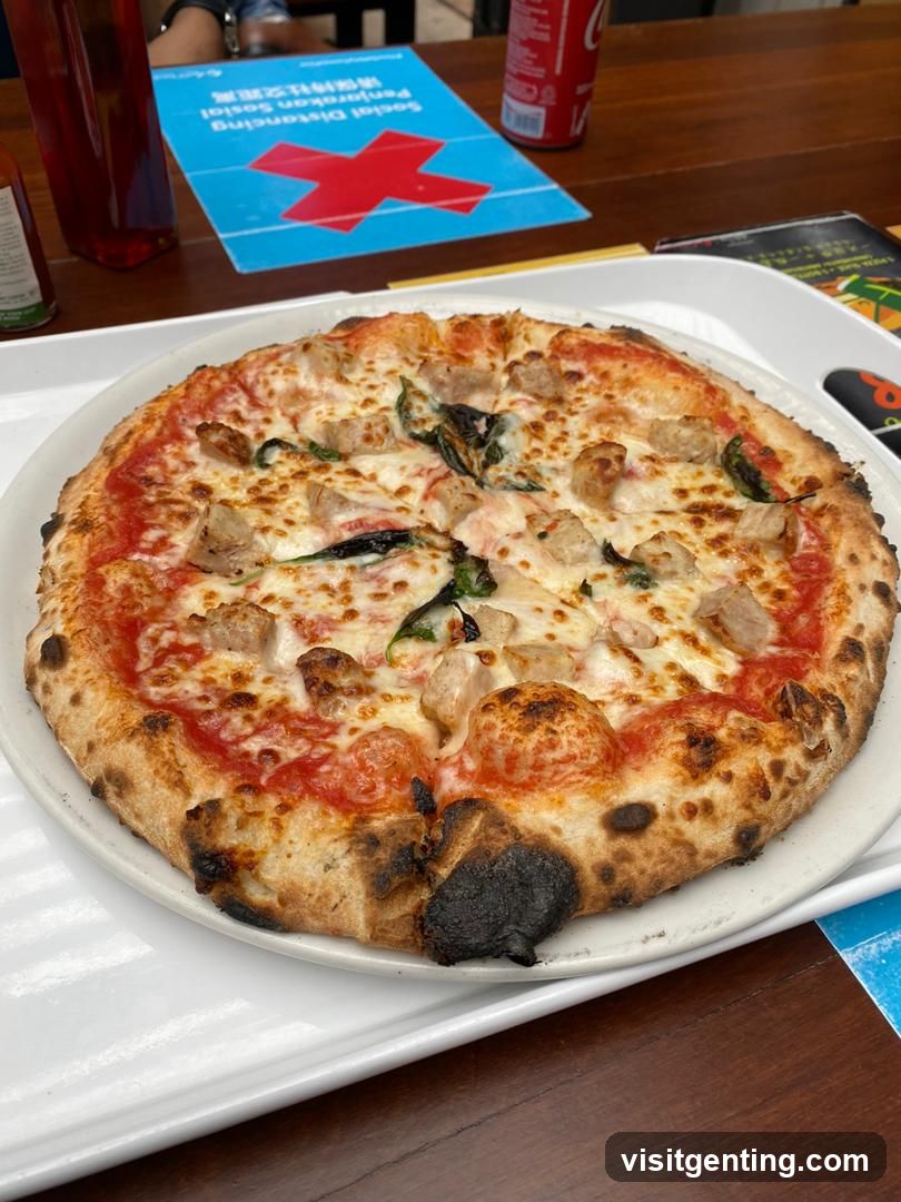 Pizza on tray with social distancing sign