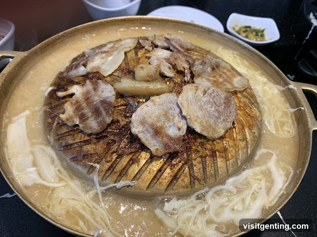 Grilled meat dish on hot plate