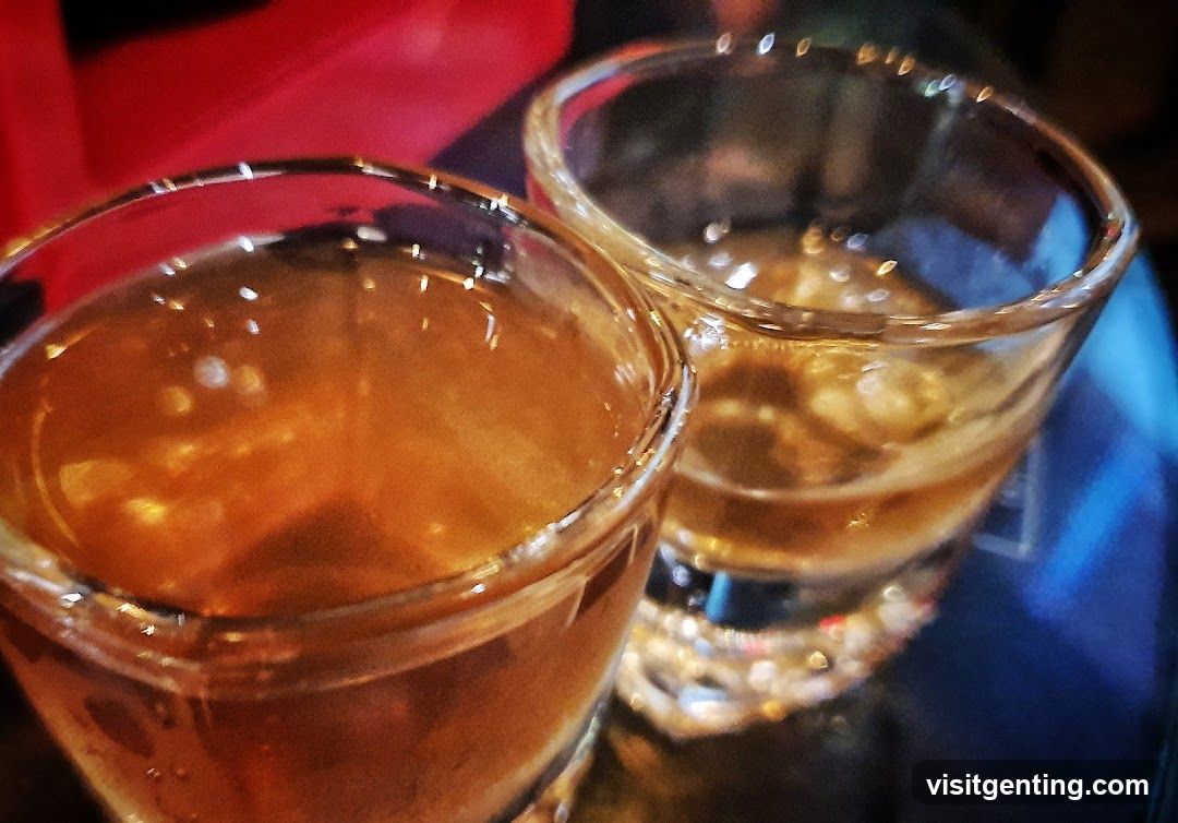 Two Shot Glasses with Alcohol