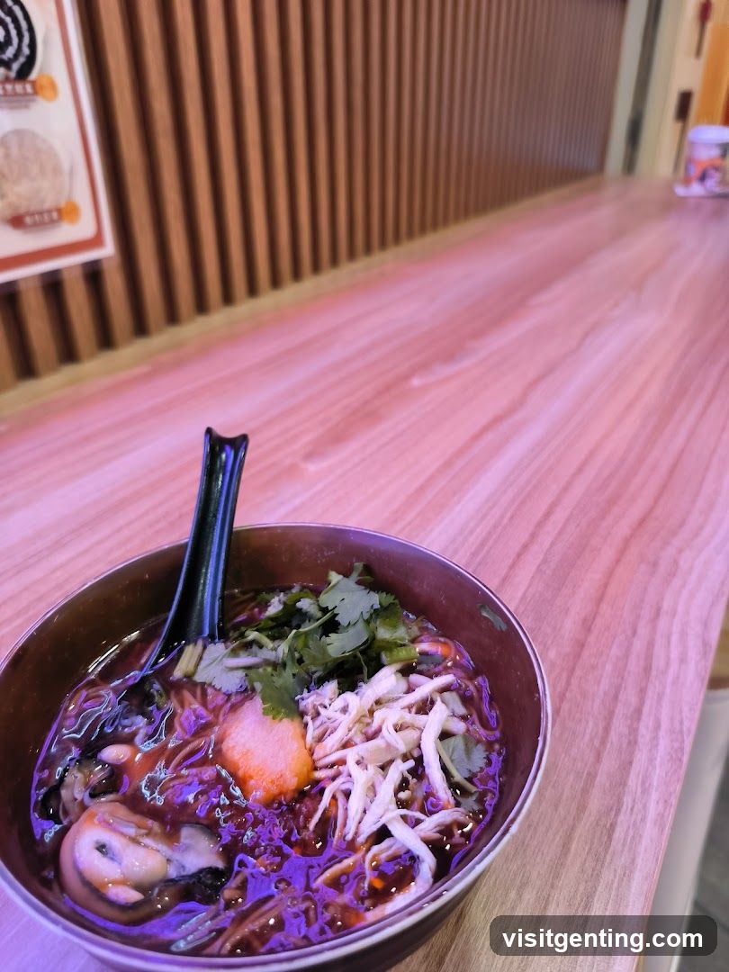 Bowl of Noodle Soup on Wooden Counter