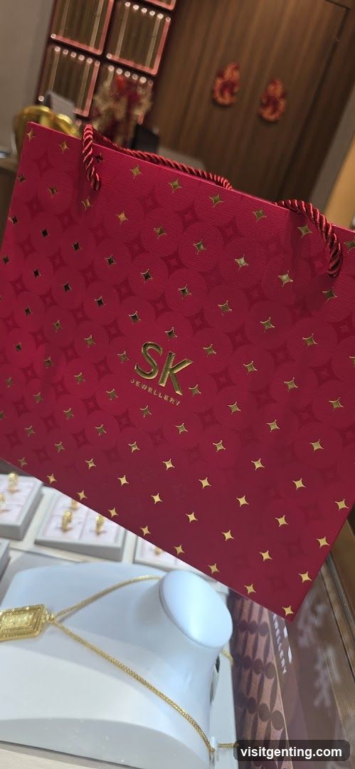 Red shopping bag with SK logo