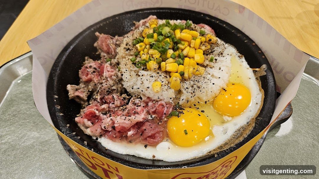 Stir-fried rice dish in a stone pot
