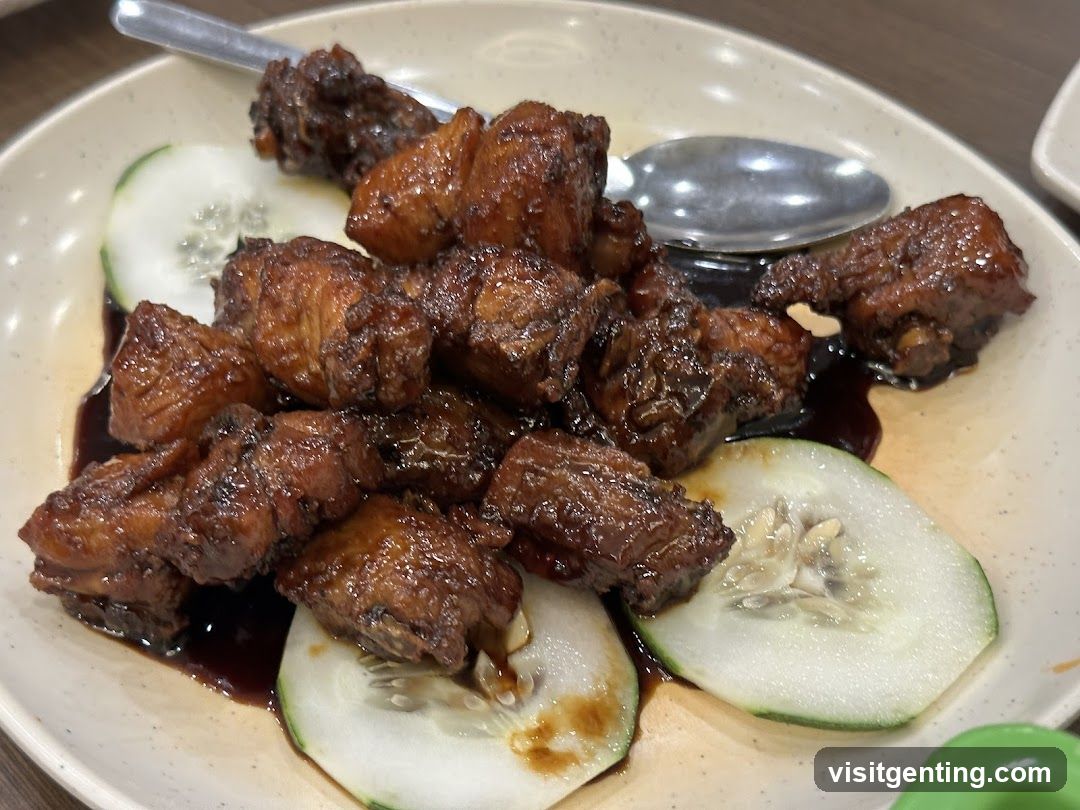 Dish of braised chicken with cucumber slices