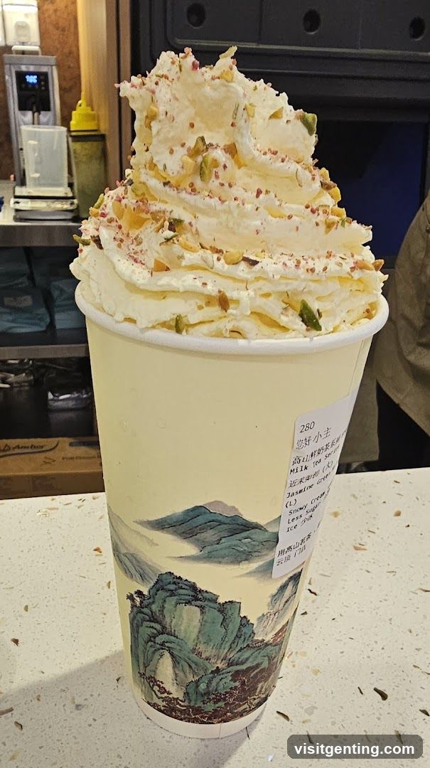 Cup of beverage with whipped cream topping