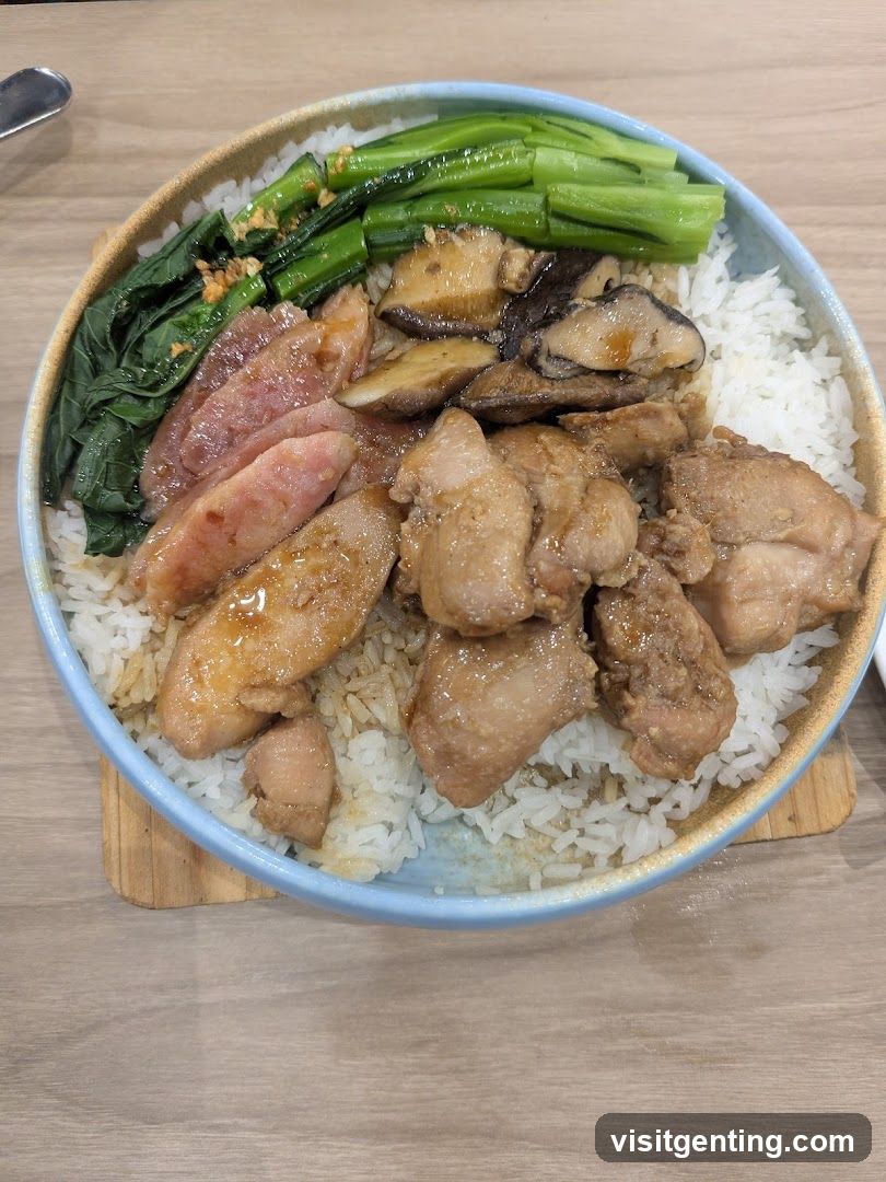 Rice bowl with chicken, mushrooms, greens