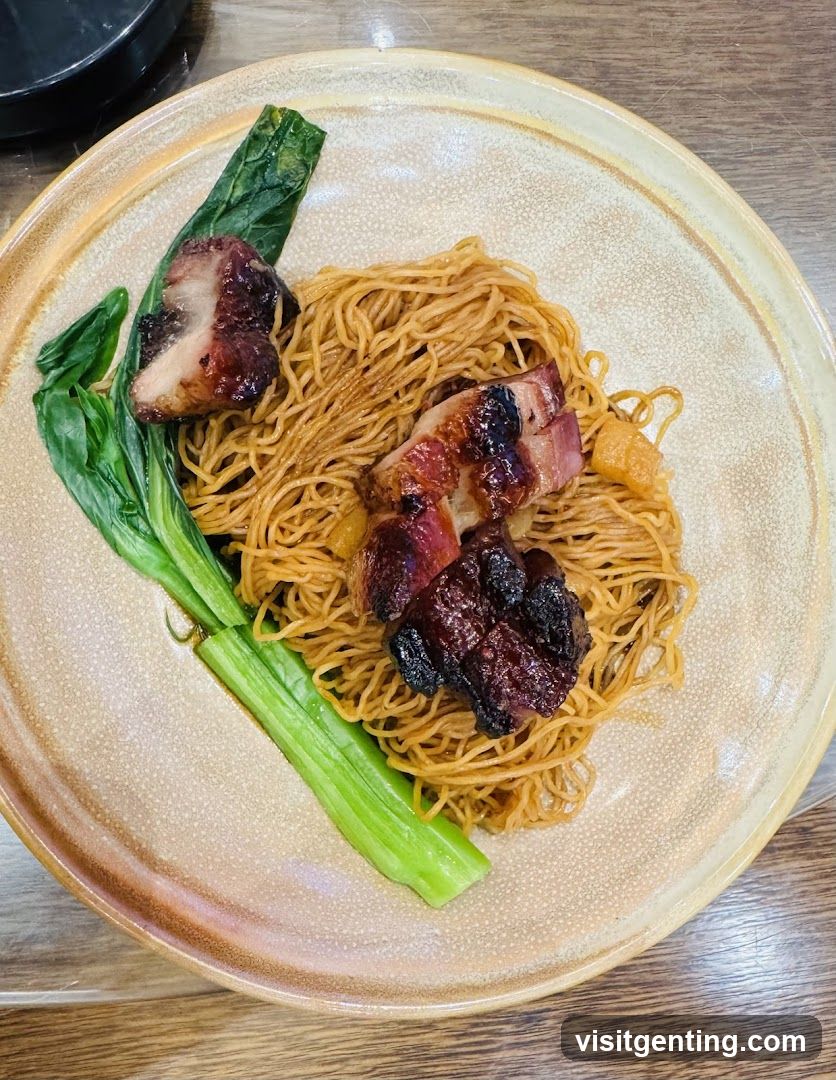 Noodles with roasted meat and greens