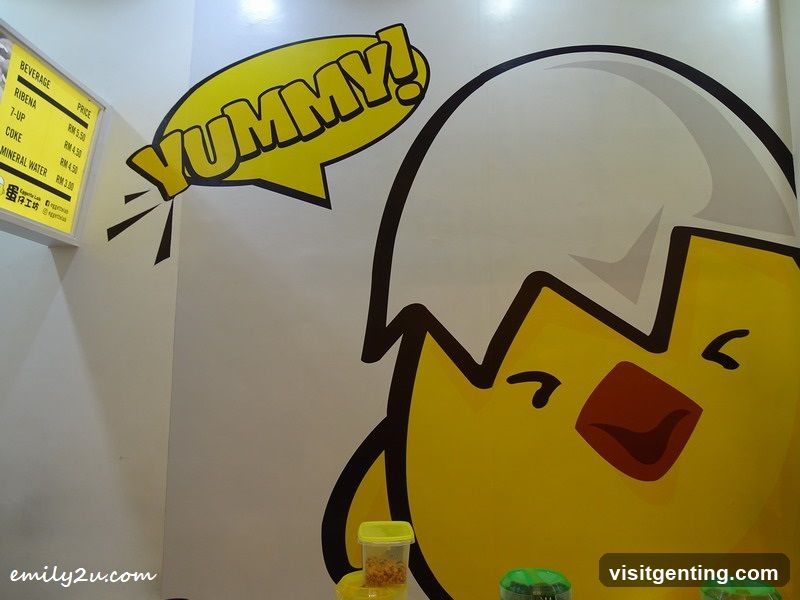 Wall mural with cartoon chick and beverage price list
