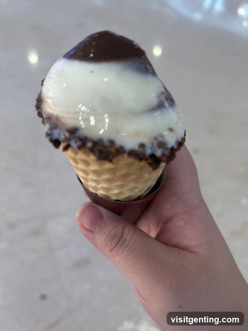 Hand Holding Ice Cream Cone