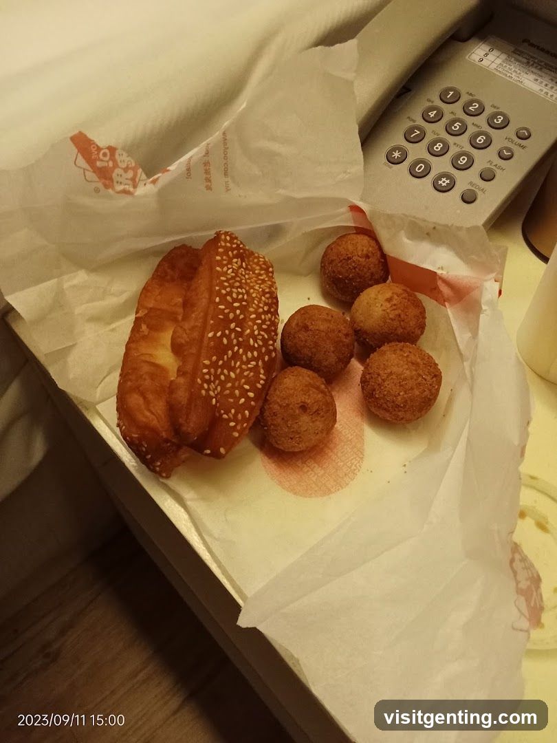 Food on a surface next to a phone