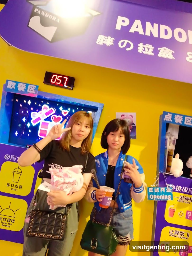 Two individuals posing in front of a PANDORA storefront