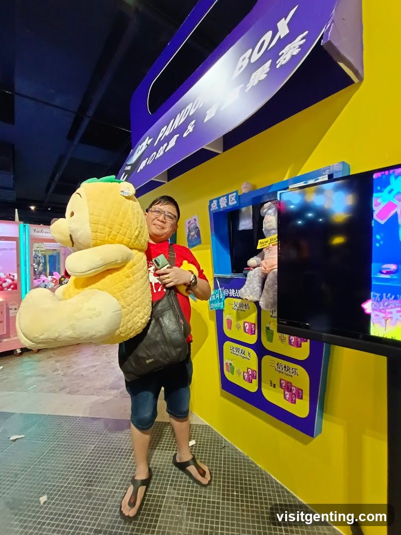 Person with plush toy in arcade setting
