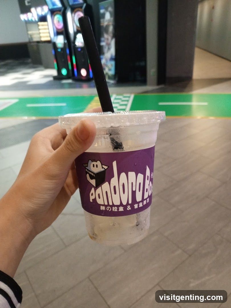 Hand holding drink cup
