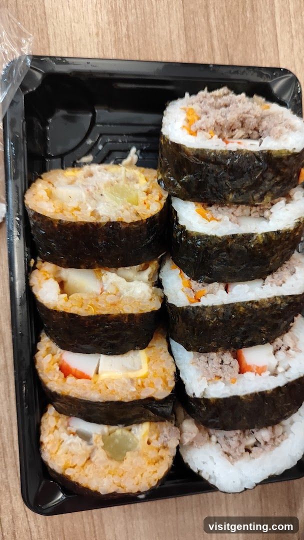 Sushi Rolls in Black Container