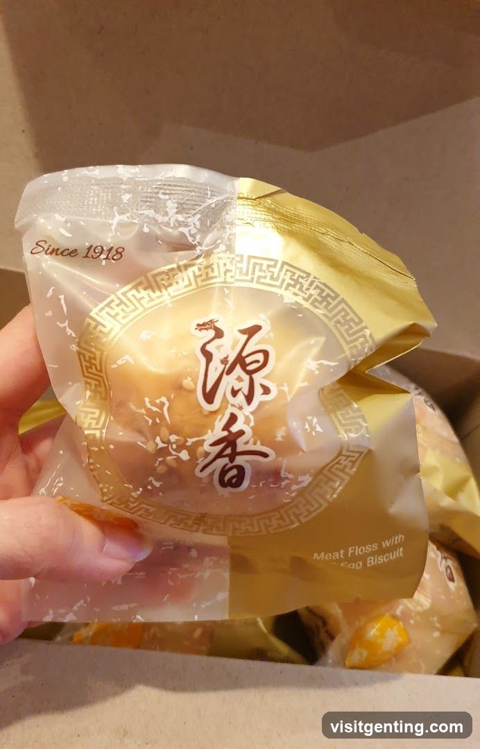 Hand holding packaged food item