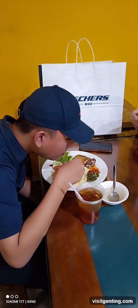 Person Eating at Table