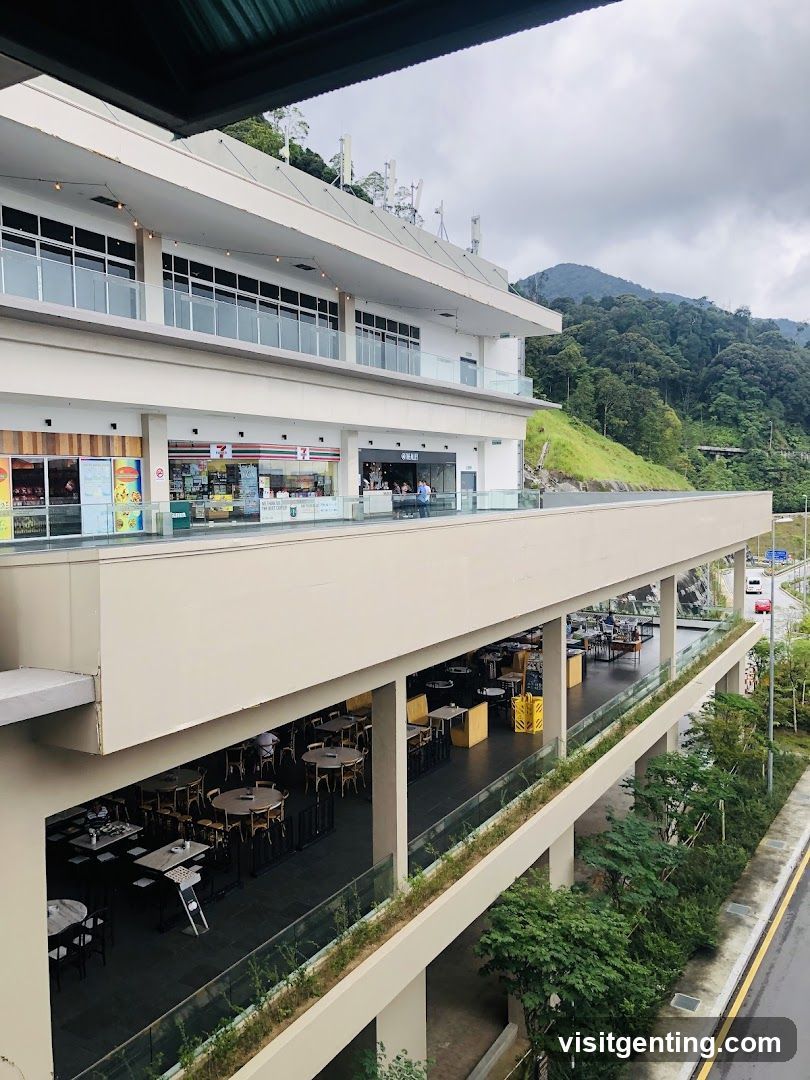 Multi-level commercial building with outdoor seating and 7-Eleven storefront