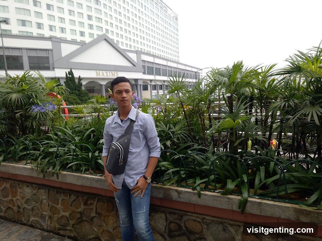 Person Standing in Front of Building
