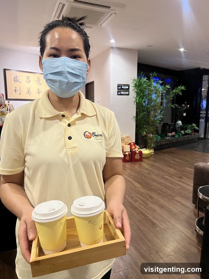 Staff Holding Coffee Cups