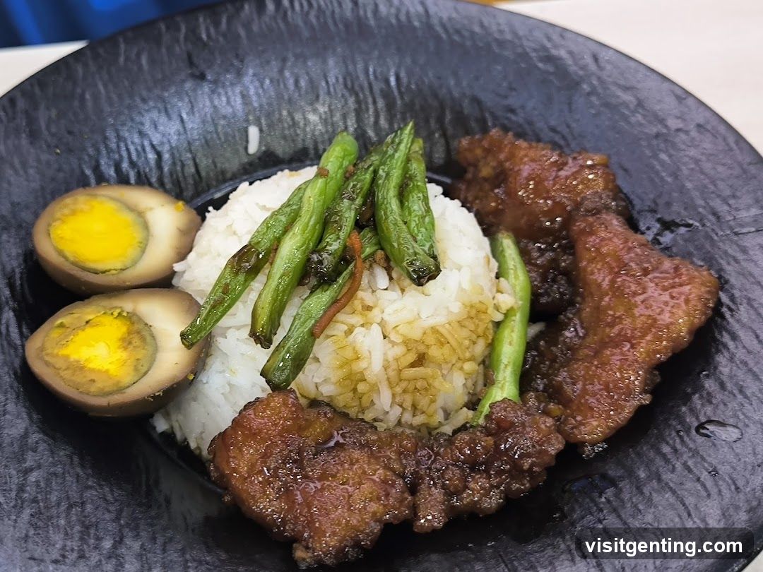 Rice bowl with meat, vegetables, and boiled eggs