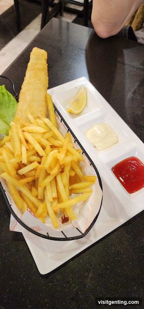 Fish and chips with condiments