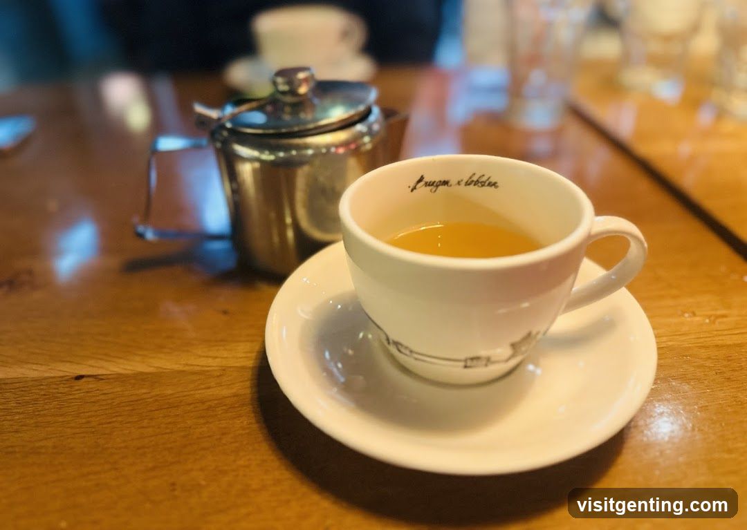 Tea Cup and Teapot on Wooden Table