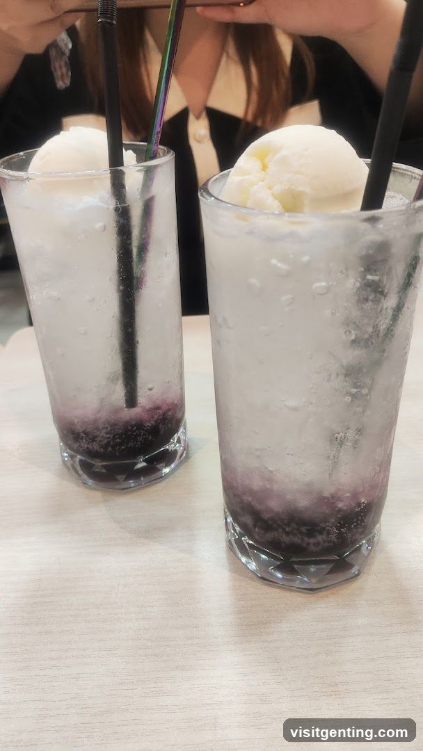 Two iced beverages with ice cream