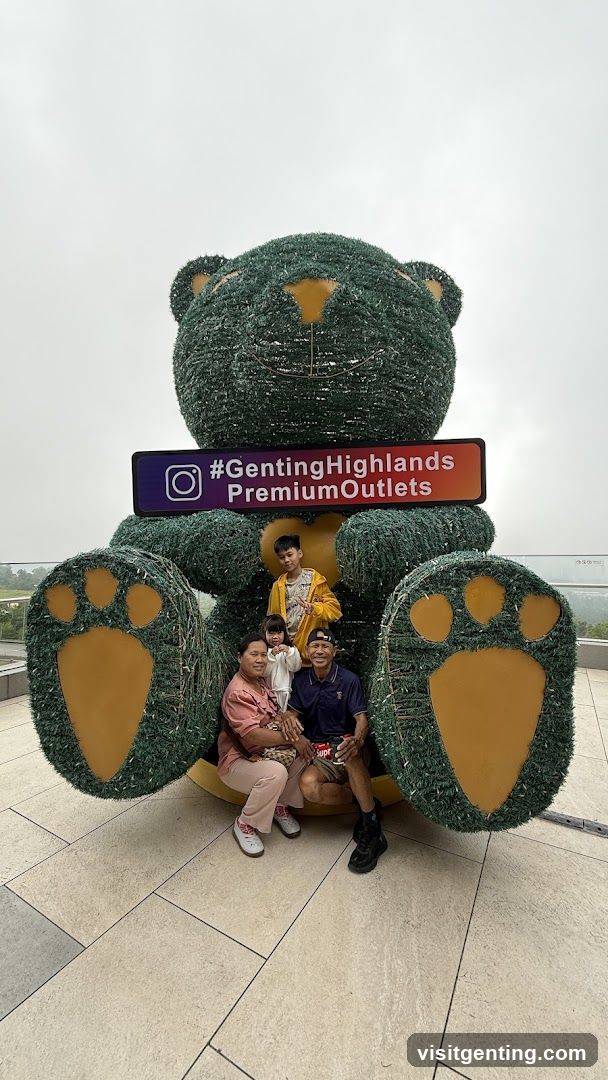 Family Poses with Giant Teddy Bear
