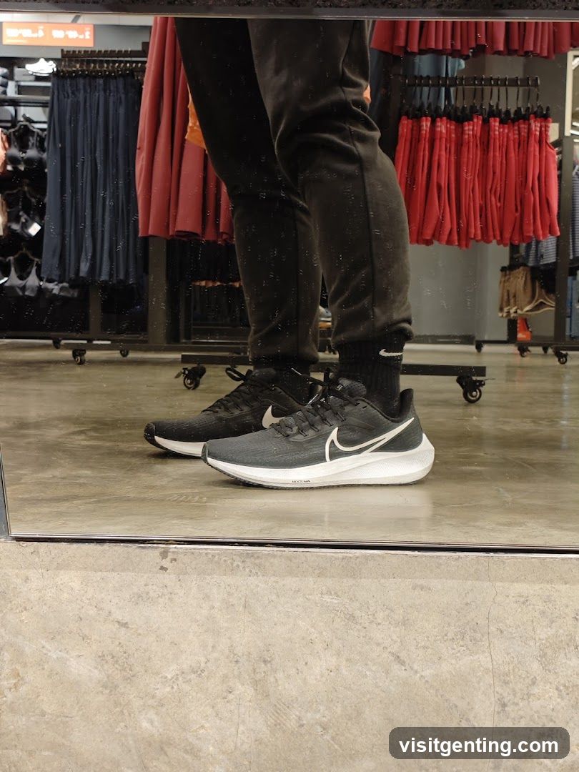 Man wearing Nike shoes and sweatpants