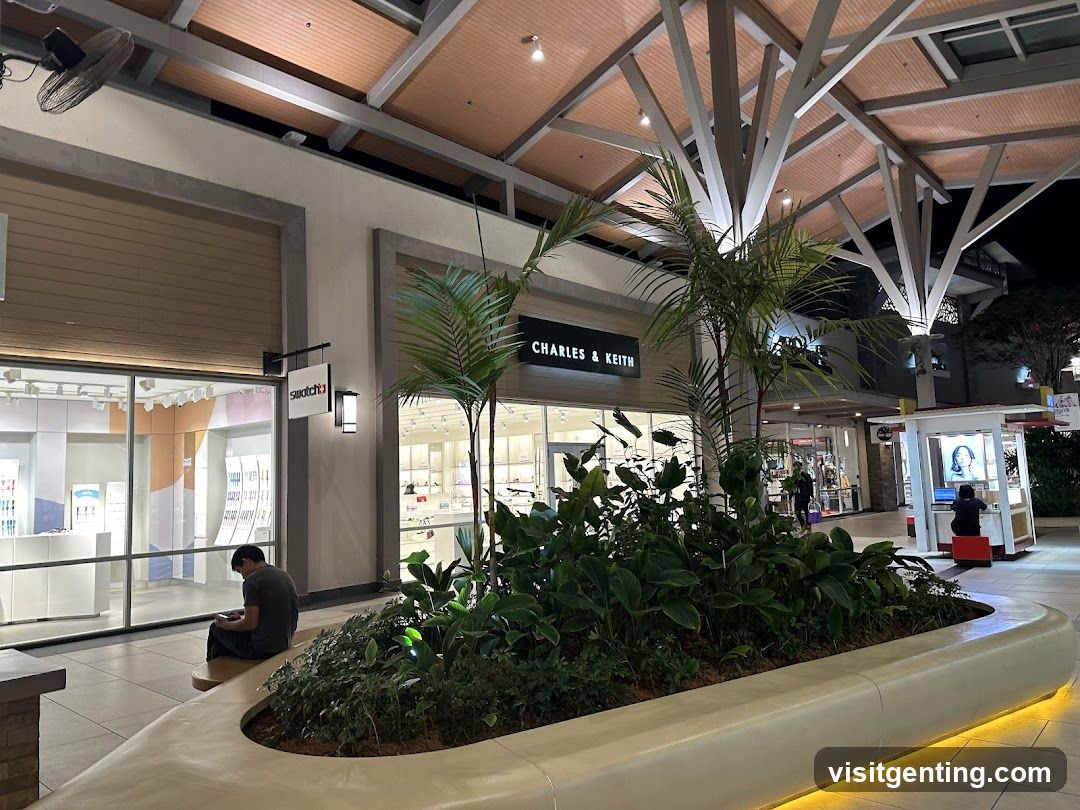 Outdoor shopping area with stores and plants
