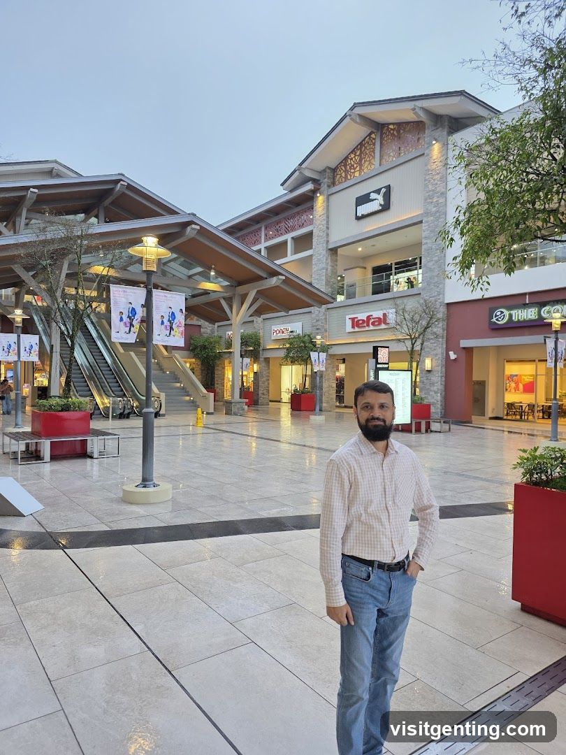 Man standing in an outdoor mall
